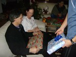 Giving John and Suzanne presents