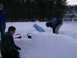 We're building an Igloo. We use garbage cans to make the blocks.